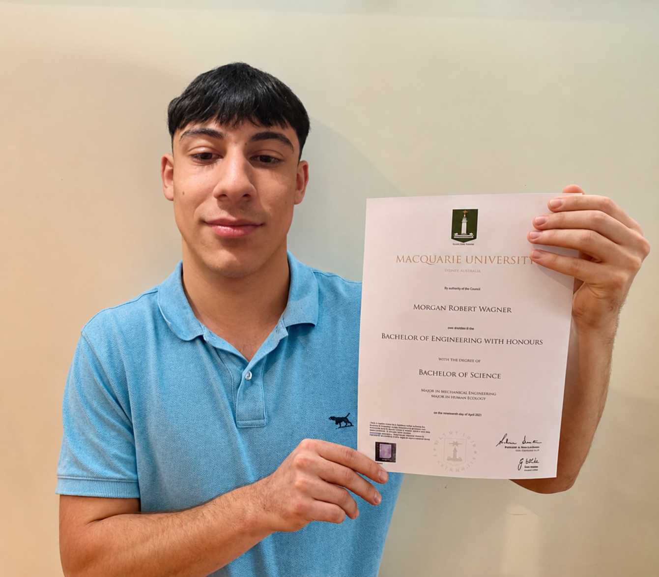 Me holding my future degree